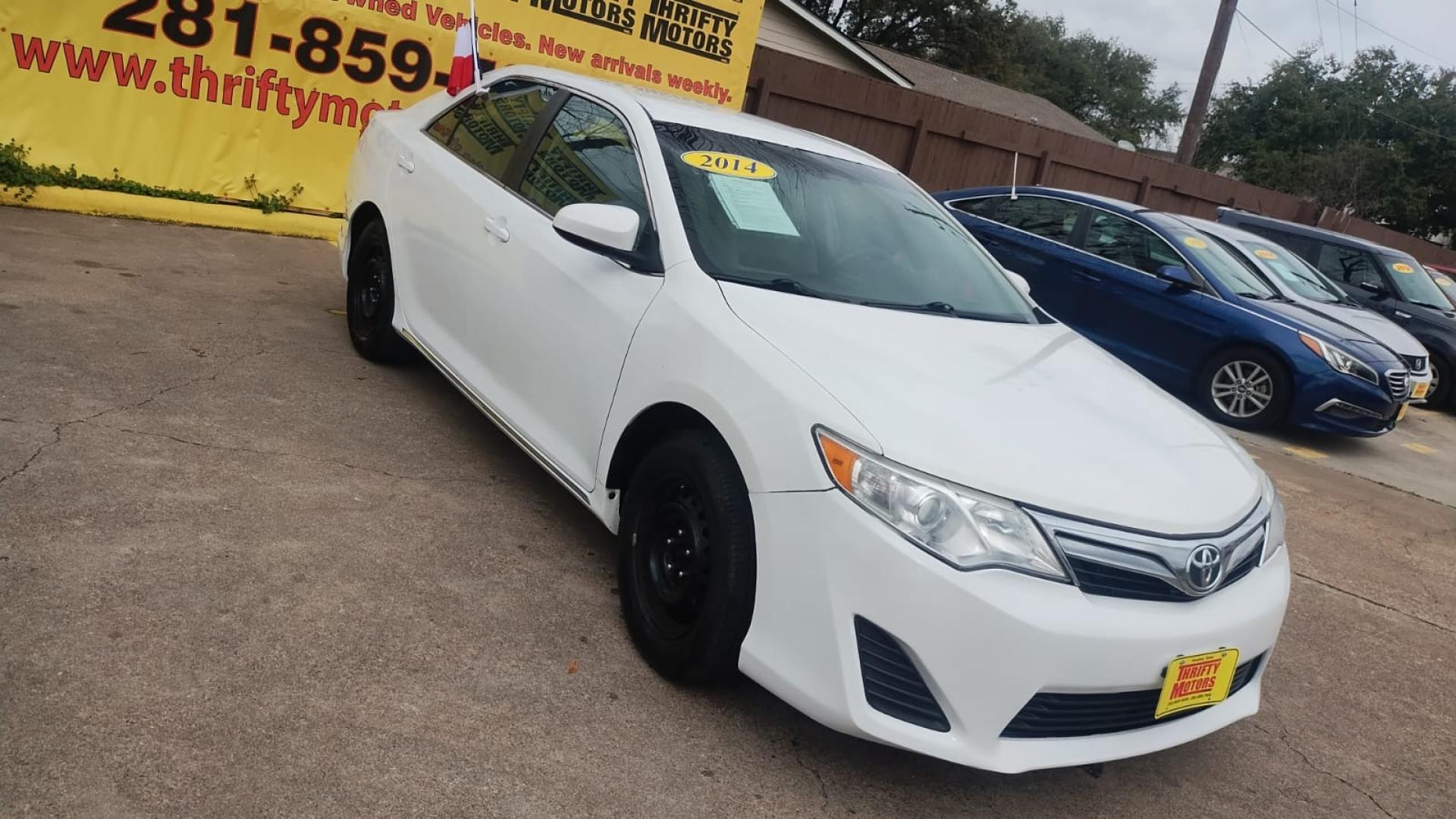 2014 Toyota Camry (4T4BF1FK1ER) , located at 16710 Clay Rd., Houston, TX, 77084, (281) 859-7900, 29.834864, -95.656166 - Photo#4